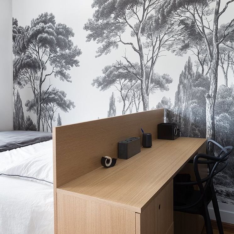 Bureau dans chambre separe par muret