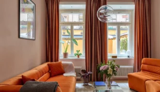 small-orange-and-pink-living-room-wooden-floor